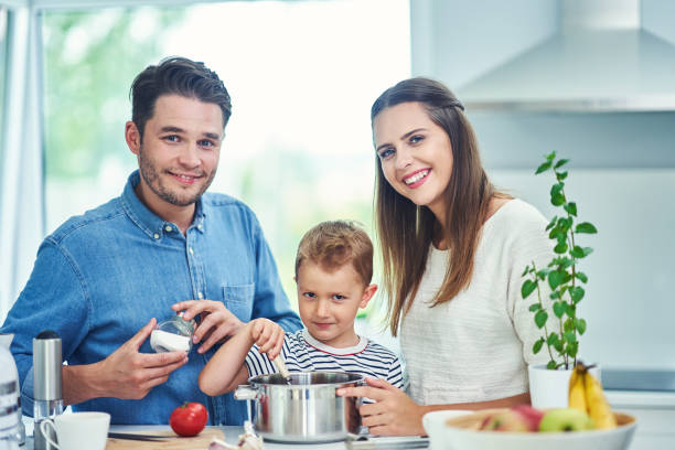 istock Young family spending time together in the kitchen 1175041308
