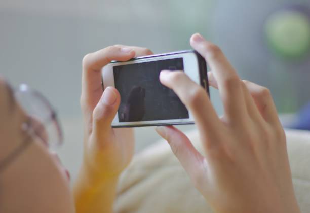 istock A boy lying on his mobile phone 1175041587
