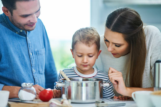 istock Young family spending time together in the kitchen 1175041617