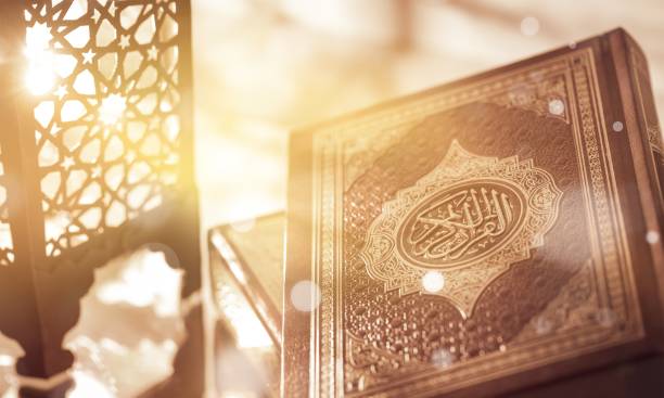 Quran. Islamic Book Koran with prayer beads on grey koran photos stock pictures, royalty-free photos & images