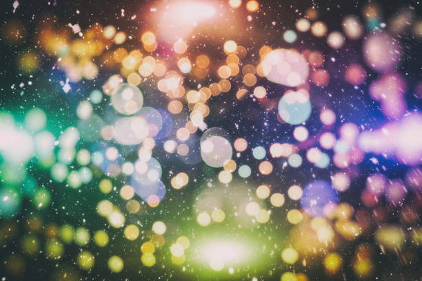 istock Bright abstract circular bokeh background blur on a dark background 1175042007