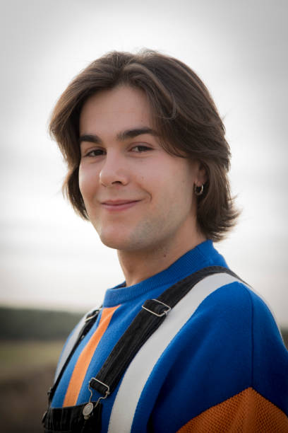 istock YOUNG MAN WITH STRIPED JERSEY 1175043755