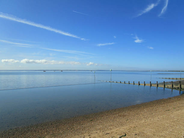 istock Calm blue water and big blue sky on a sunny day 1175049904