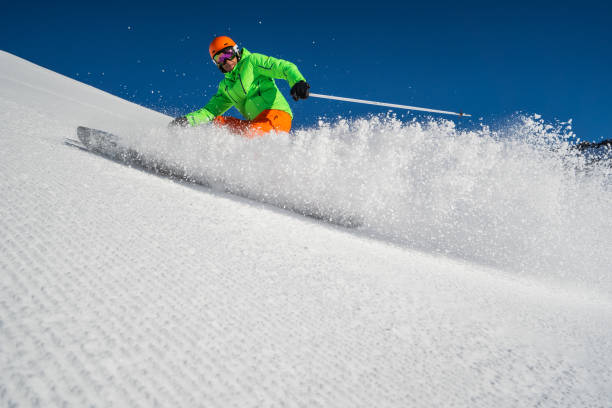 istock one skier stopping on ski slope on sunny day 1175050672
