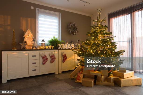 Decorated Christmas Fir Tree In Apartment Stock Photo - Download Image Now - Christmas, Christmas Tree, Living Room