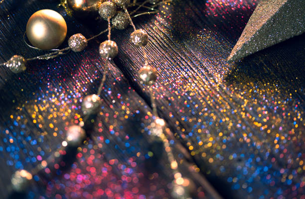 istock Shiny Christmas decorations on glitter background 1175052073