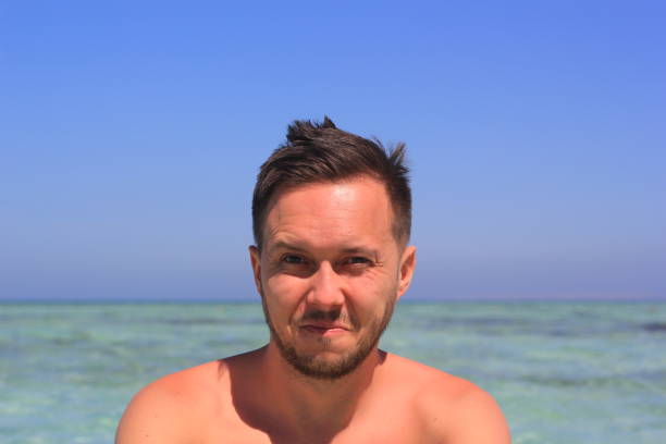 istock Face of a man with emotions pleasure 1175052088