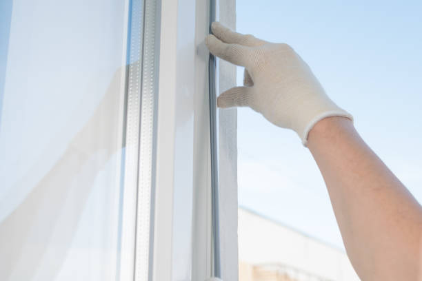 istock replacement of a rubber band in a plastic window, closeup view 1175052334