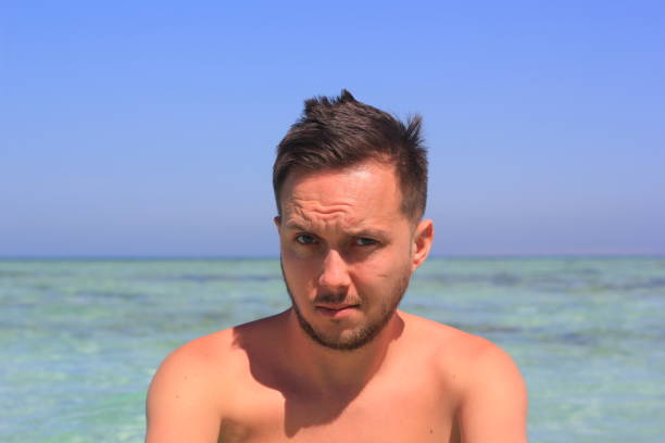 istock Face of a man with emotions outrage 1175052341