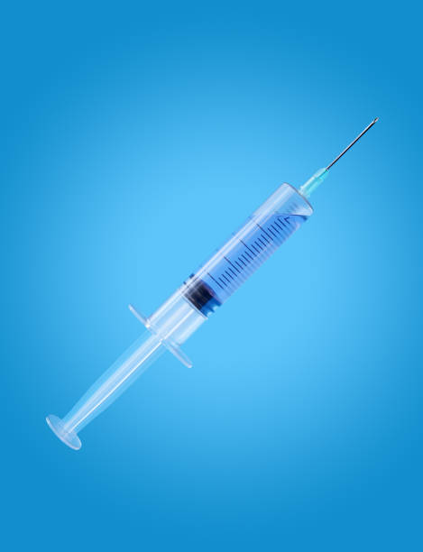 istock Syringe with medication for injection isolated on blue background with clipping path. 3d render illustration 1175053195