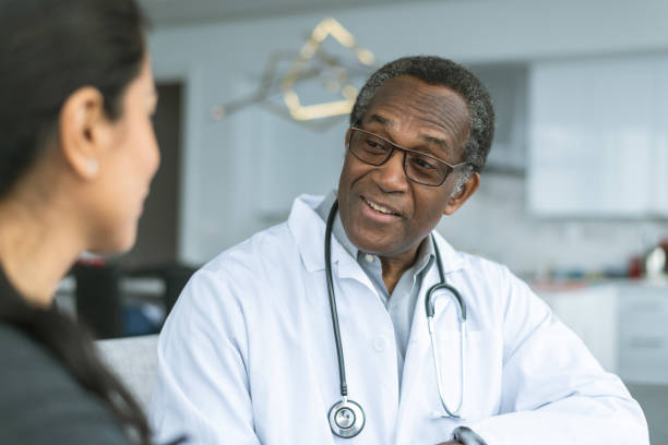 istock Kind physician consults patient 1175053320