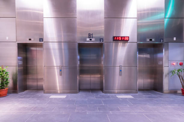 istock Front view of modern elevator with closed doors in lobby 1175057453