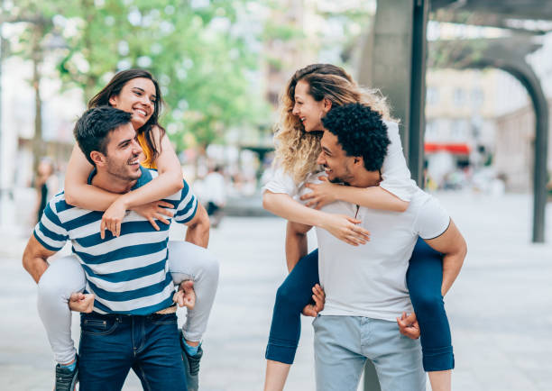 istock Happy couples out in the city 1175060929