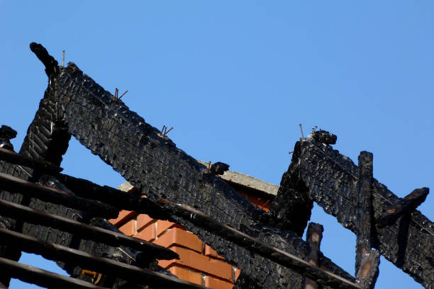 istock charred burnt black timber roof structure after fire damage 1175061963