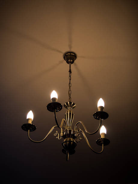 vintage chandelier shines in the dark vintage chandelier shines in the dark antler chandelier stock pictures, royalty-free photos & images