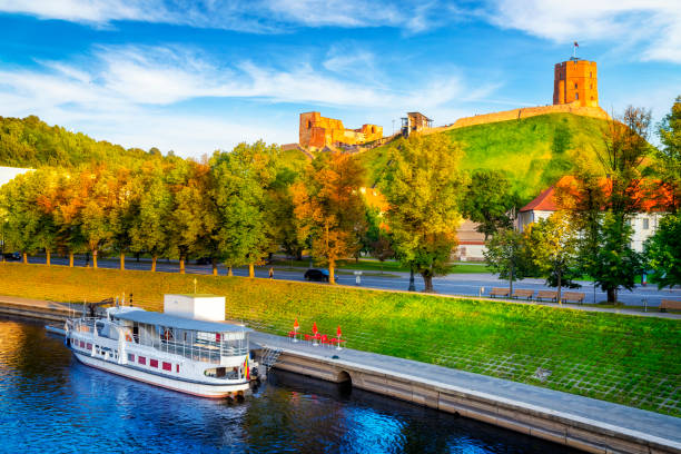 Wilia river and Gediminas Tower on the hill, Vilnius, Lithuania Wilia river and Gediminas Tower on the hill, Vilnius, Lithuania circa 14th century photos stock pictures, royalty-free photos & images