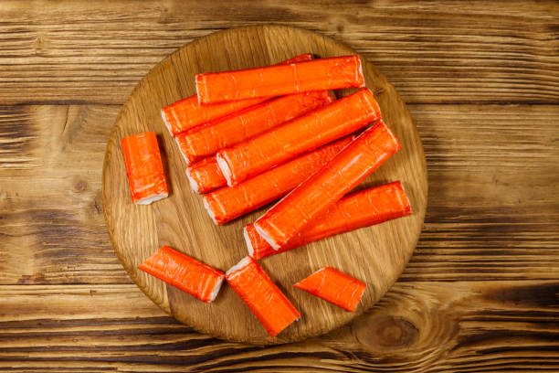 istock Crab sticks on cutting board on wooden table 1175063994