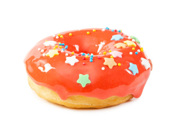 istock Donut with orange glossy mirror glaze isolated on white 1175064105