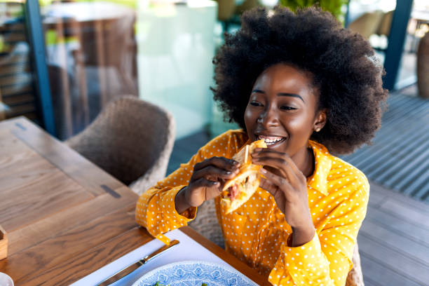 istock Happy young woman taking break 1175069976