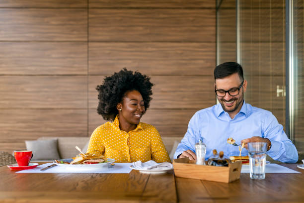 istock Couple in coffee shop 1175070373
