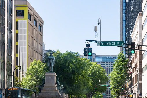 Atlanta, USA - April 20, 2018: Henry Grady monument statue by Forsyth street in downtown of Georgia city in summer