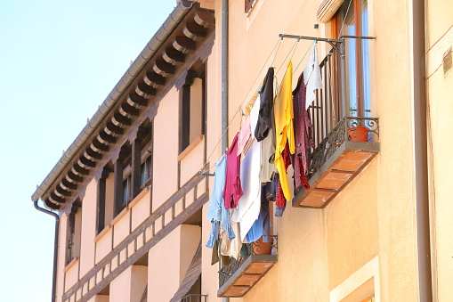 Old building cityscape with laundry hanging Segovia Spain