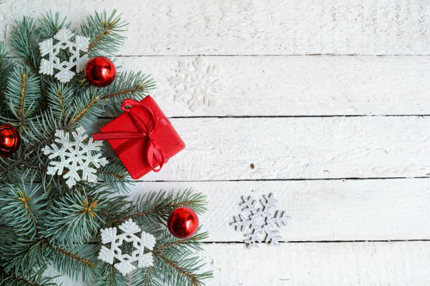 istock Christmas card with gift box and Christmas decorations on a white background 1175074792