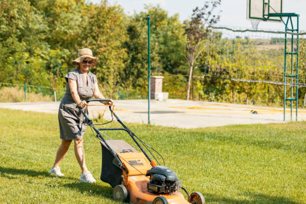 istock Senior woman mowing grass 1175075568
