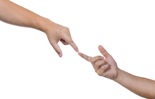 istock Touching finger. Two hands of different ages gently touching with the index fingers. two hands reaching out their fingers about to touch. 1175077361