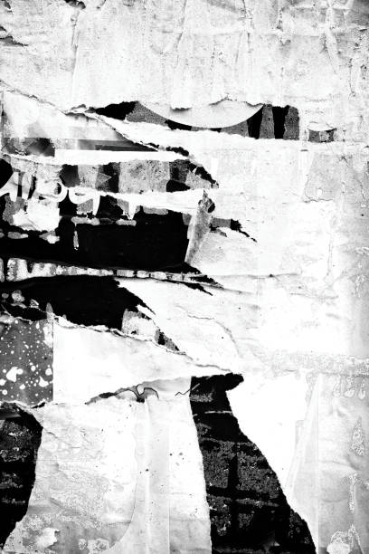 istock Blank white black old ripped torn paper crumpled creased posters grunge textures backdrop backgrounds placard 1175077964