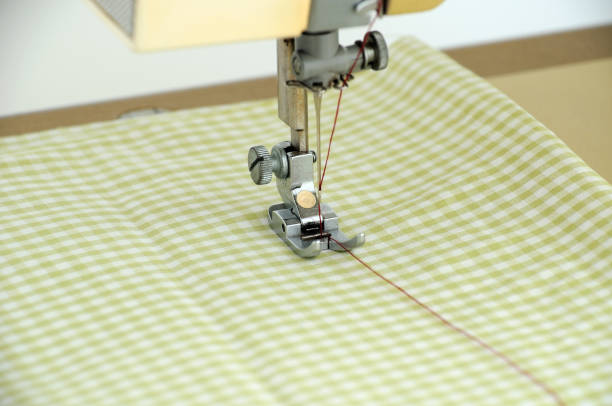 istock the sewing machine is prepared for the process of sewing clothes 1175078158