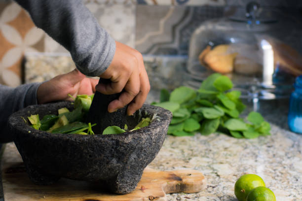 istock Shot of a man making a classic mexican sauce 1175079338