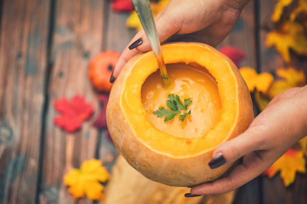 Homemade Pumpkin Soup Fresh homemade pumpkin soup squash soup stock pictures, royalty-free photos & images