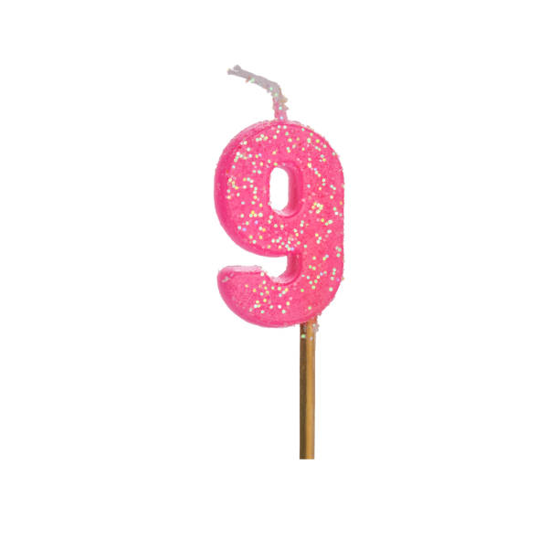 istock Birthday candle isolated on white 1175081866