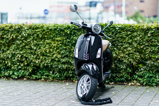 Gothenburg, Sweden - 9th September, 2019 : Vespa one of the famous brend in scooter stye motor parked near Lindholmen where many offices located in Gothenburg