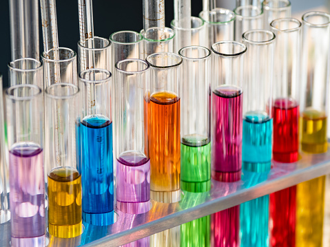 Test tubes with a colored reagents.