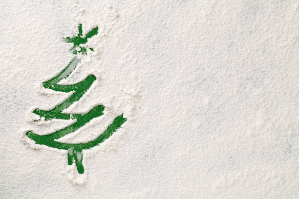 istock Christmas Tree On Snow Flour Background 1175088383