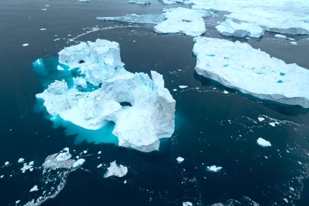 istock Massive Iceberg floating in Arctic Ocean in Greenland 1175088787
