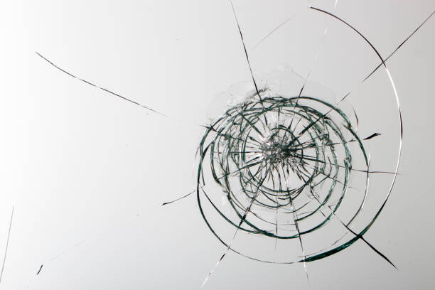 istock Cracked glass on a white background texture 1175090041