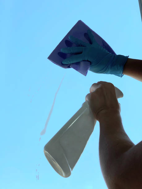 istock Window cleaner with gloves. 1175090595