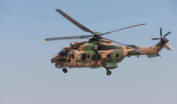 istock military helicopter in flight 1175102975