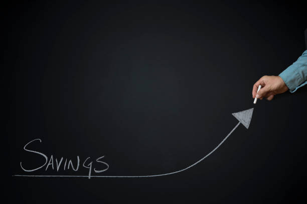 istock Growth Text and Arrow on Blackboard with Male Caucasian Hand Writing with Chalk 1175106596