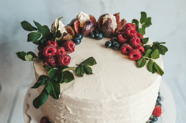 istock Cake decorated with fruits and berries 1175108518