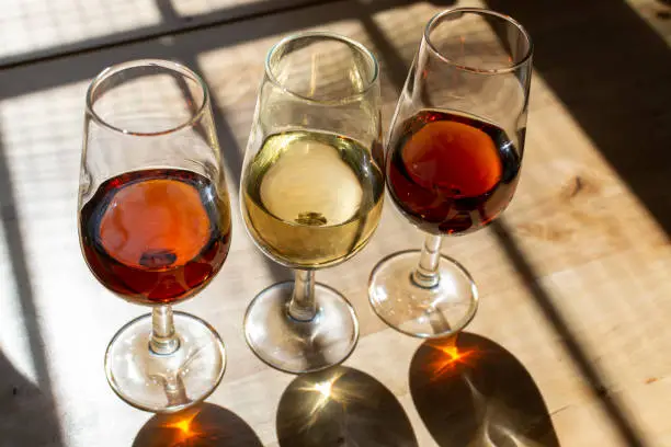 Sherry wine tasting, selection of different sweet jerez fortified wines made from pedro ximenez and muscat white grapes in Jerez de la Frontera, Andalusia, Spain