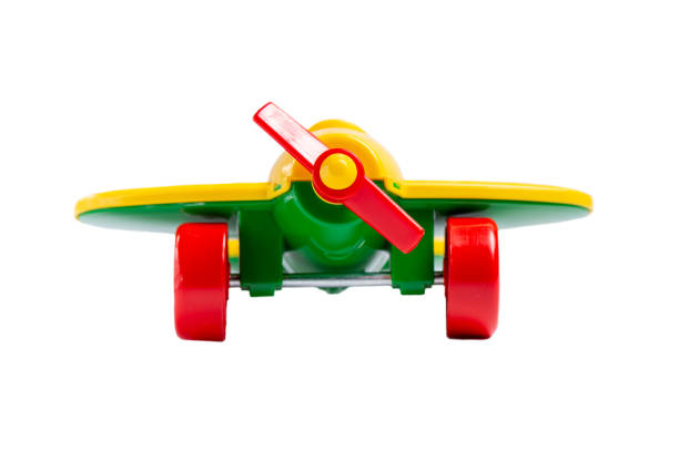 istock yellow toy airplane with propeller and landing gear isolate on a white background without shadow. The concept of travel and flight. 1175111795