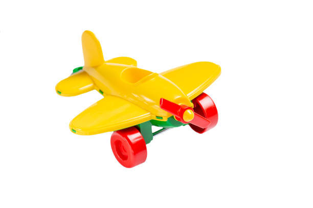 istock yellow toy airplane with propeller and landing gear isolate on a white background without shadow. The concept of travel and flight. 1175111799