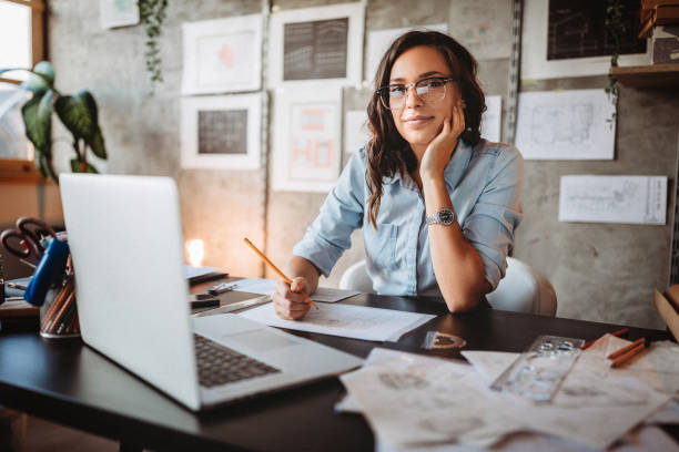 istock Successful business woman working in a design studio 1175128281