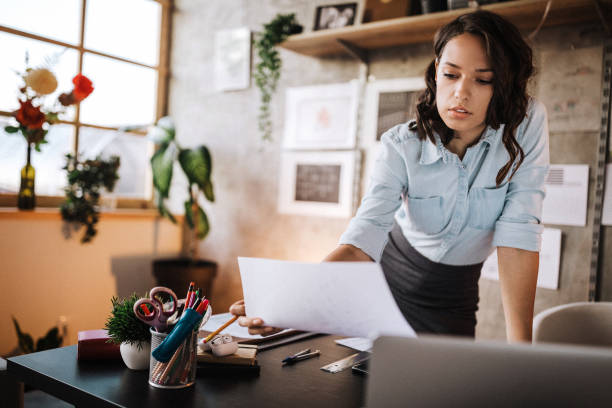 istock Successful business woman working in a design studio 1175128299