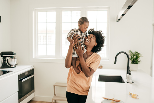 Mother and baby in the kitchen