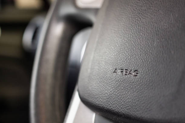istock Safety airbag sign on car steering wheel 1175129995